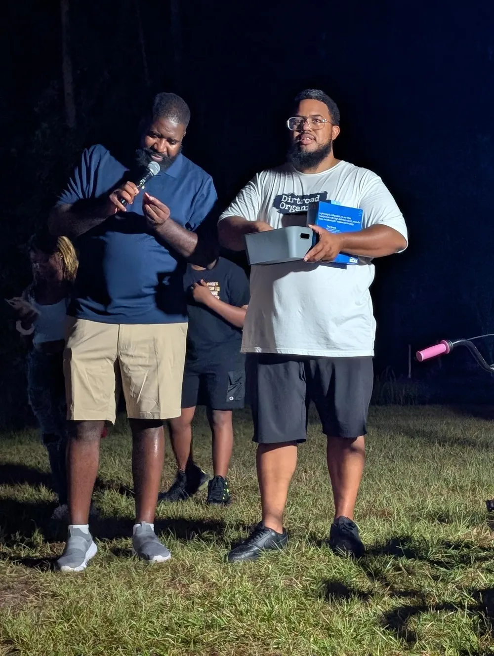 Micah King with community members